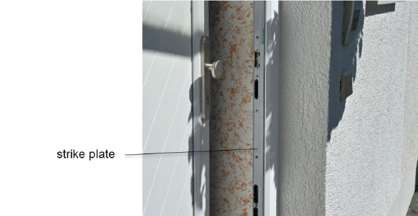 Strike plate of a half-open front door