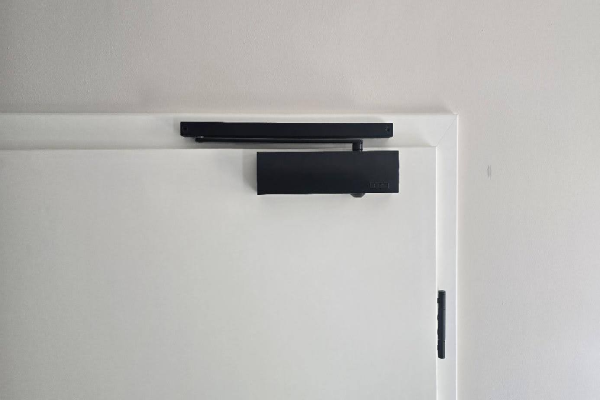 Overhead door closer from GEZE in the special color black
