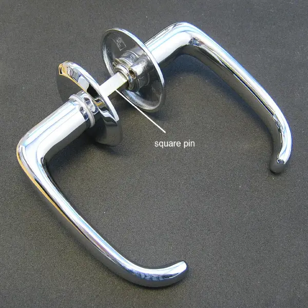 Square pin on chrome-plated door handles
